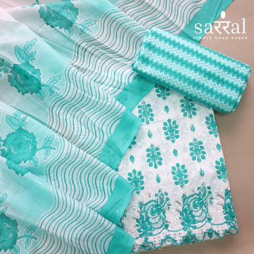 Farheen White with Teal Green Floral Printed with Embroidered Hem Cotton Suit Set