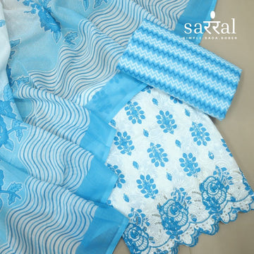 Farheen White with Blue Floral Printed with Embroidered Hem Cotton Suit Set