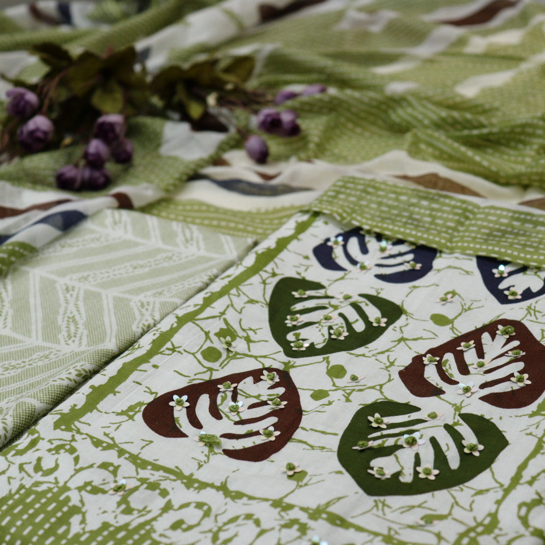 Parchhai Parrot Green Patra Detailing in Batik Leaf Printed Cotton Suit Set